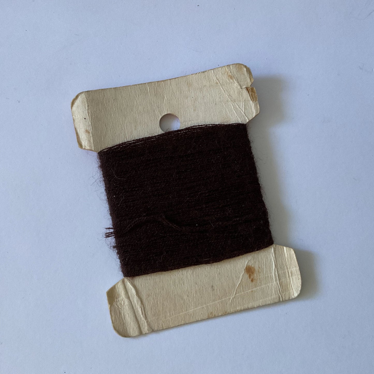 Brown French darning thread for mending socks, knitting or embroidery, visible mending, mindful sewing