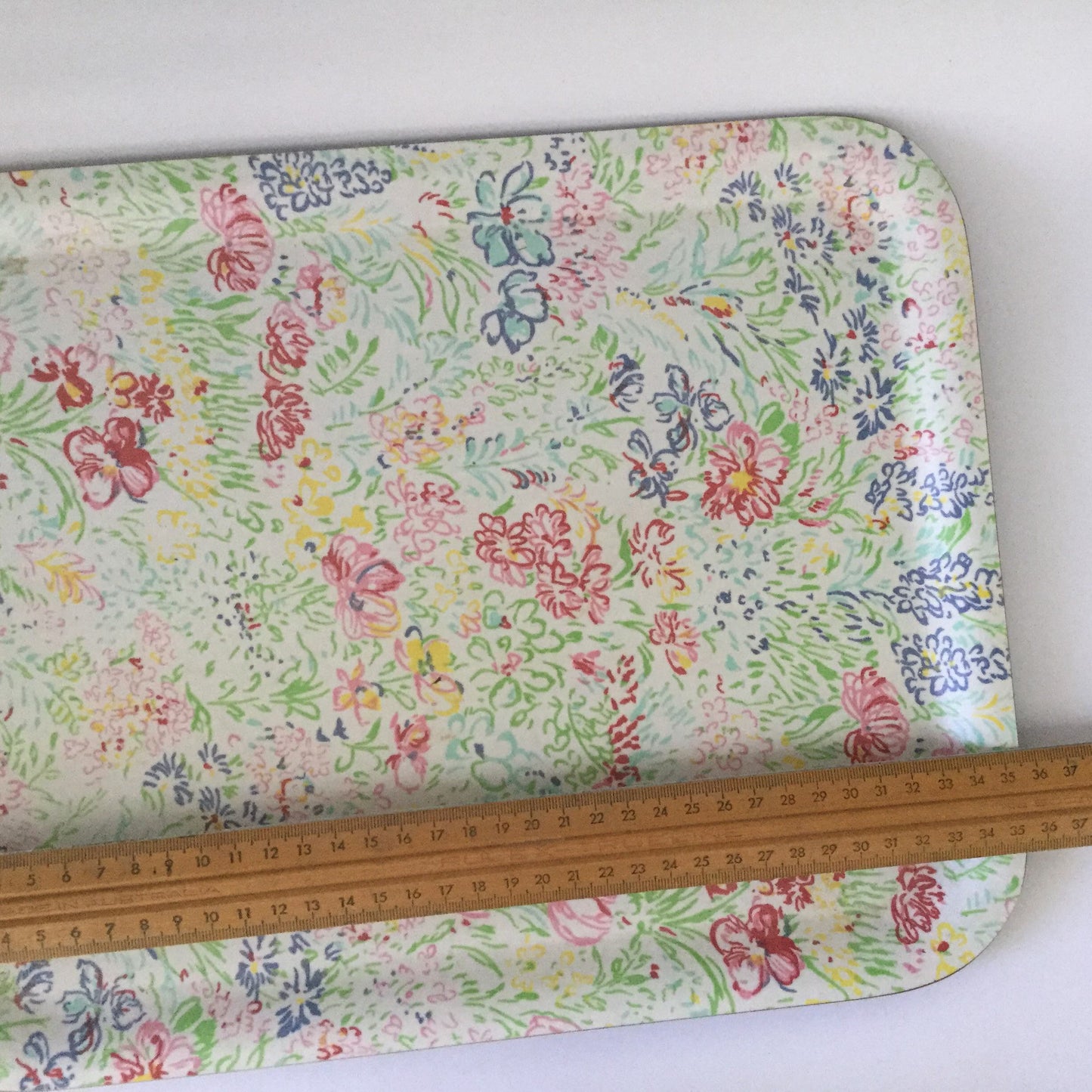 Floral design serving tray with squiggly colourful flowers in Ken Done style - eighties solid plastic tray