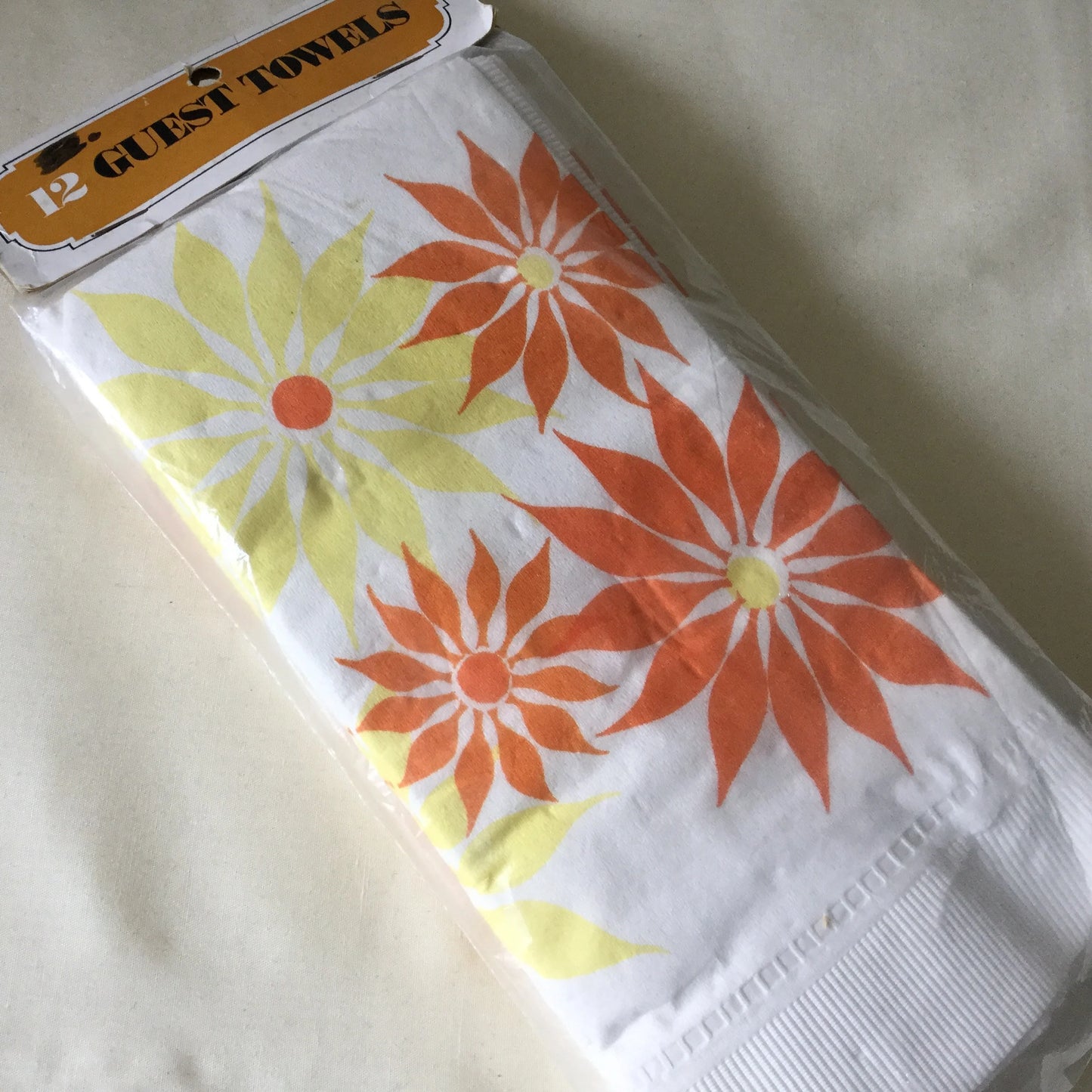 1960's groovy paper guest towels or napkins - 12 thick paper with bright orange and yellow flowers
