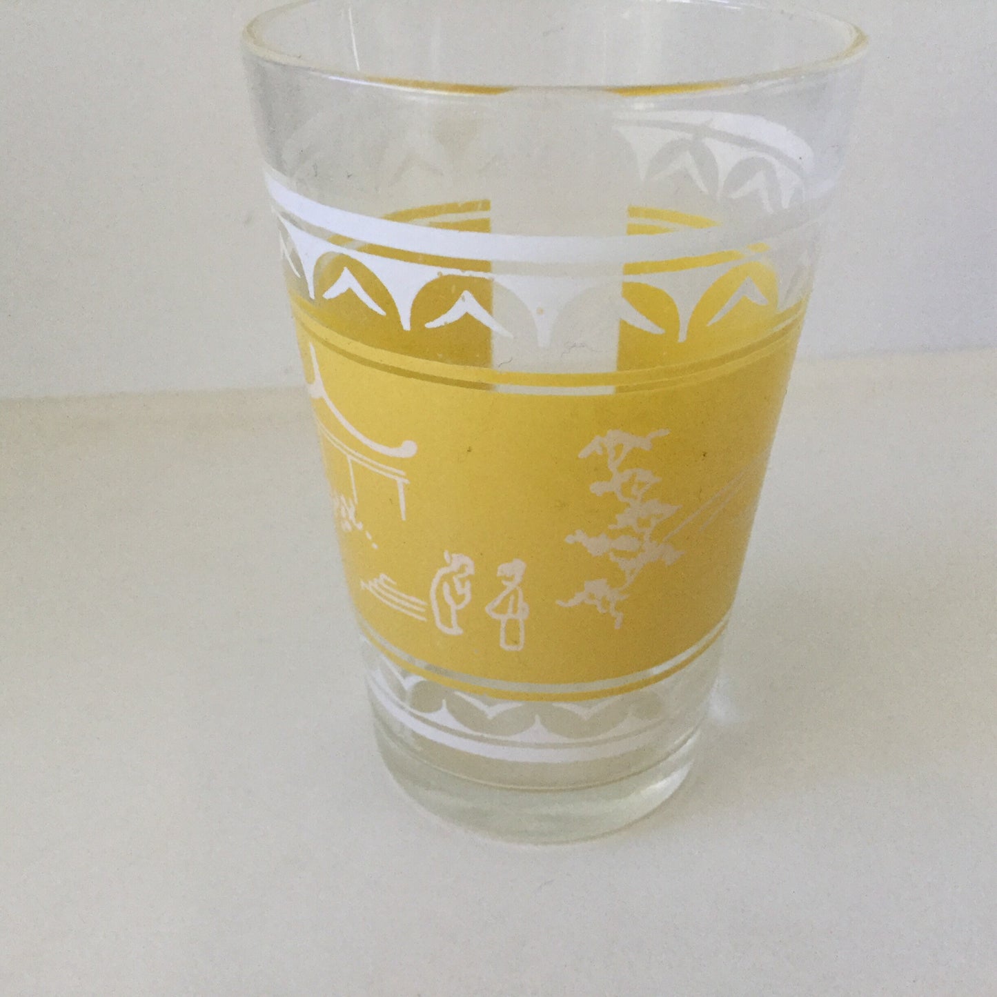 Two drinking glasses with Chinese pagoda and garden scene - small decorative glasses, mid century