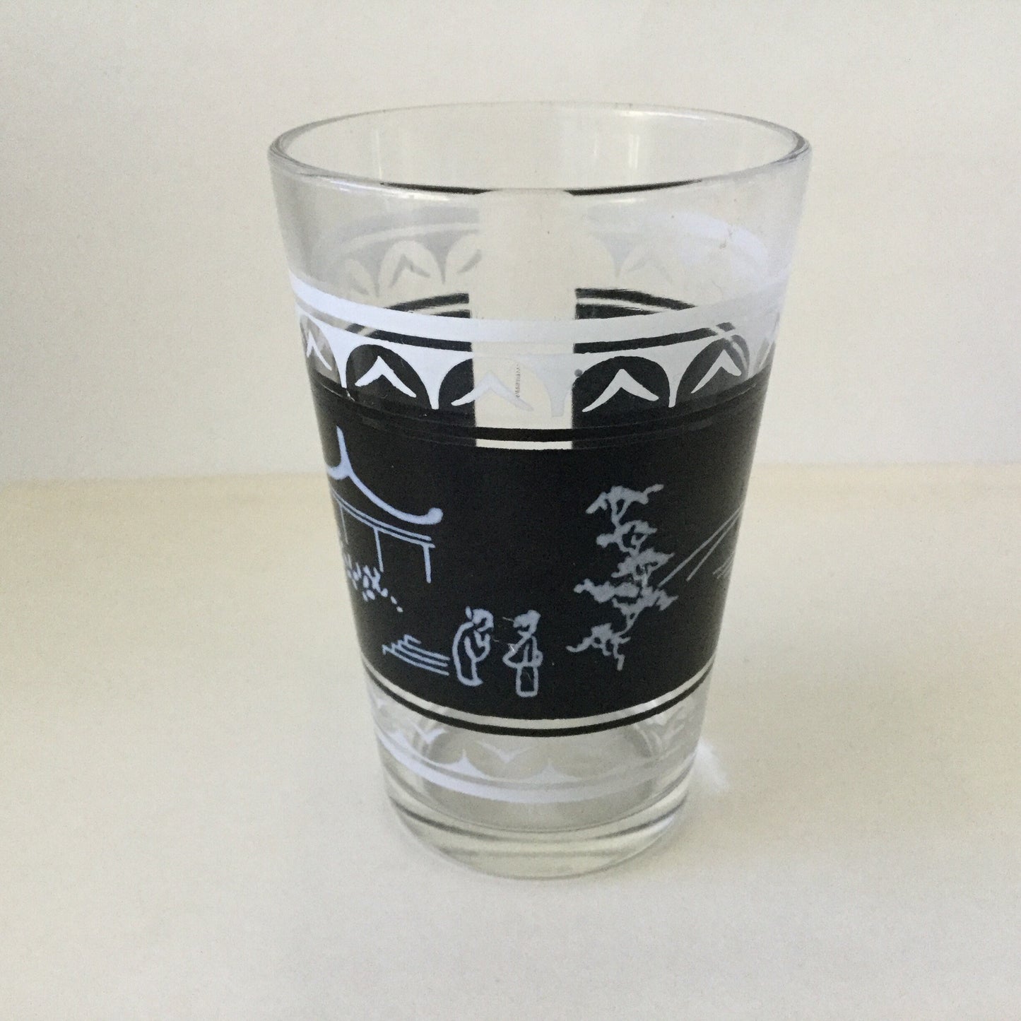 Two drinking glasses with Chinese pagoda and garden scene - small decorative glasses, mid century