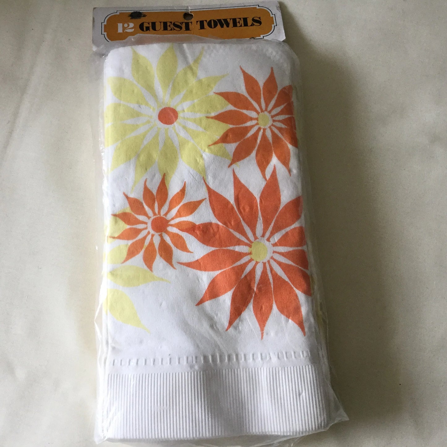 1960's groovy paper guest towels or napkins - 12 thick paper with bright orange and yellow flowers