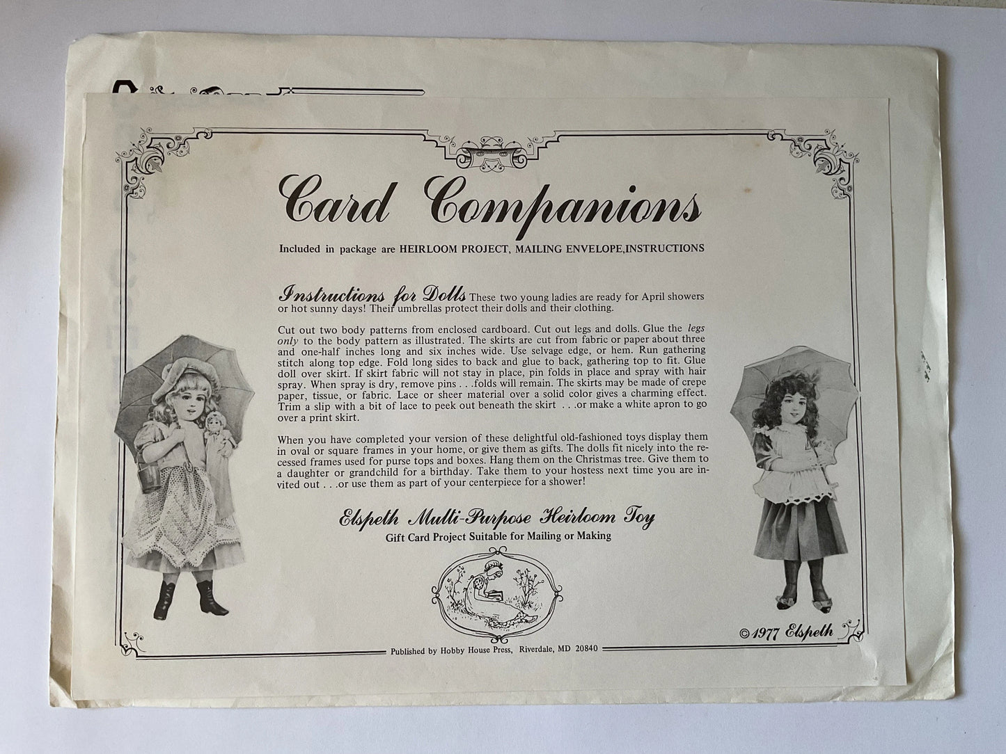 April Dolls - 1970's heirloom cut out paper doll and pattern - sweet little girls with real fabric skirts