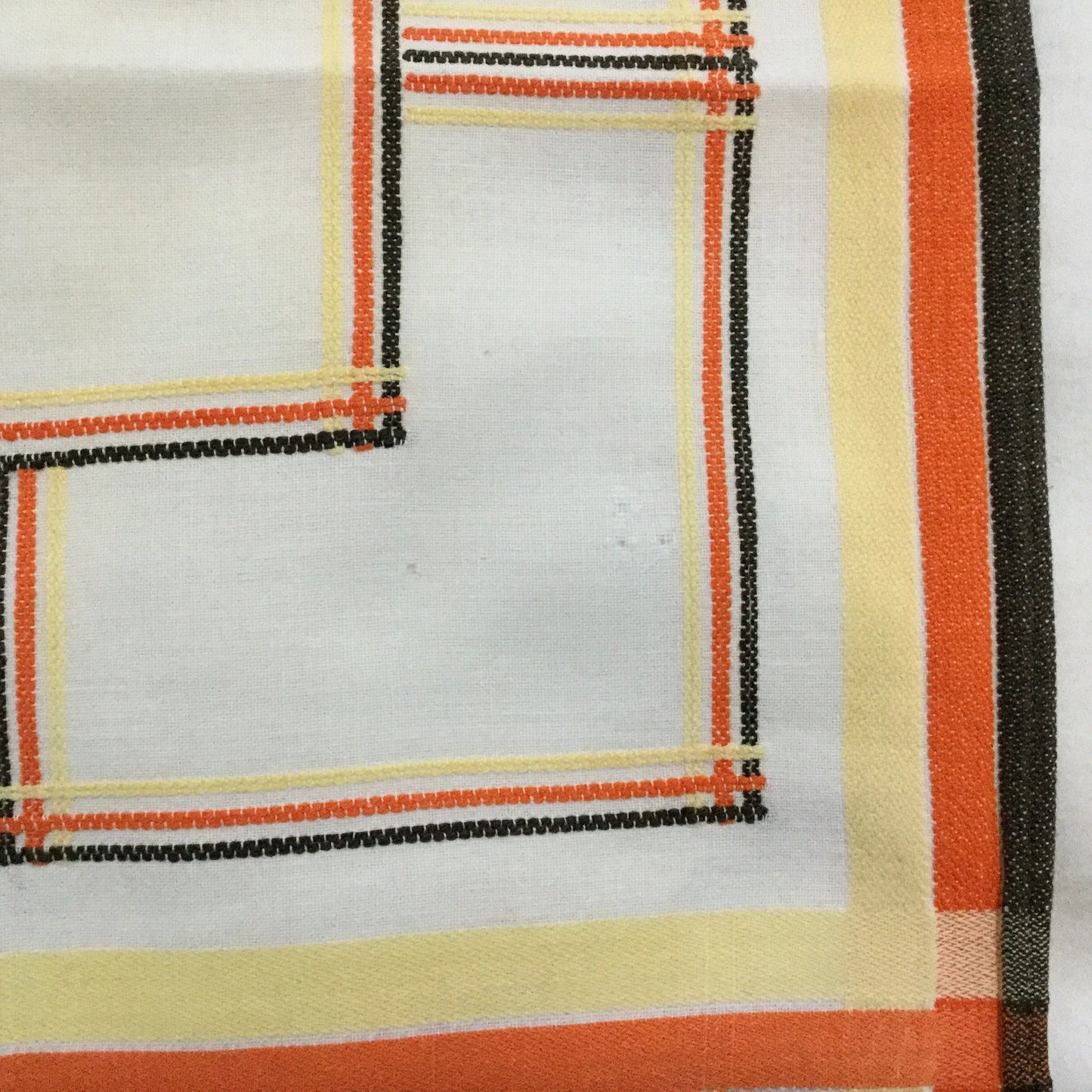 Vintage 1950s/1960s fabric napkin or placemat - embroidered orange, brown and yellow lines