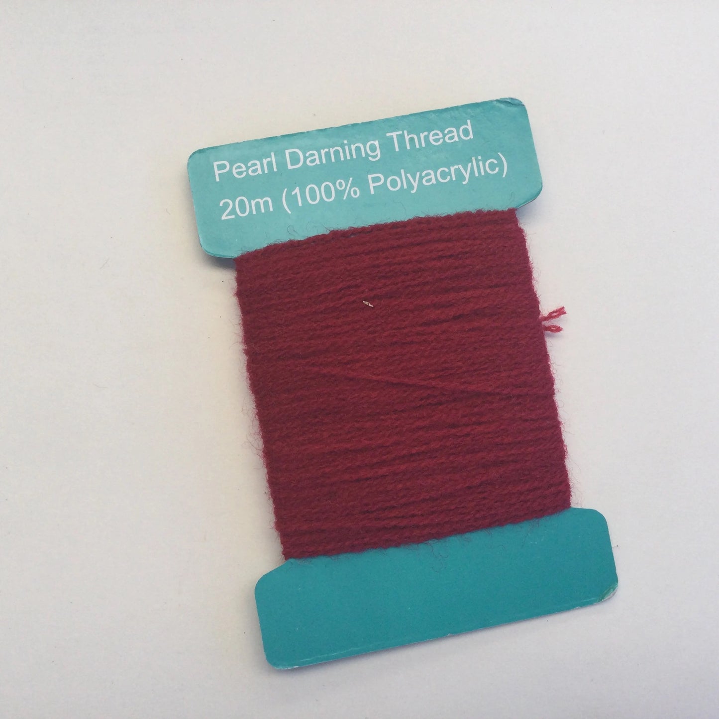 Yellow and red pearl darning thread for mending socks, knitting or embroidery, visible mending, mindful sewing