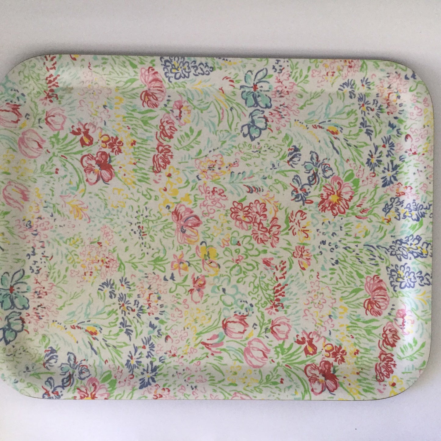 Floral design serving tray with squiggly colourful flowers in Ken Done style - eighties solid plastic tray